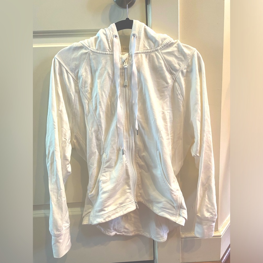 Zella Zip up Hoodie.  Size XS. White. Drawstring hood. Adjustable waistband.